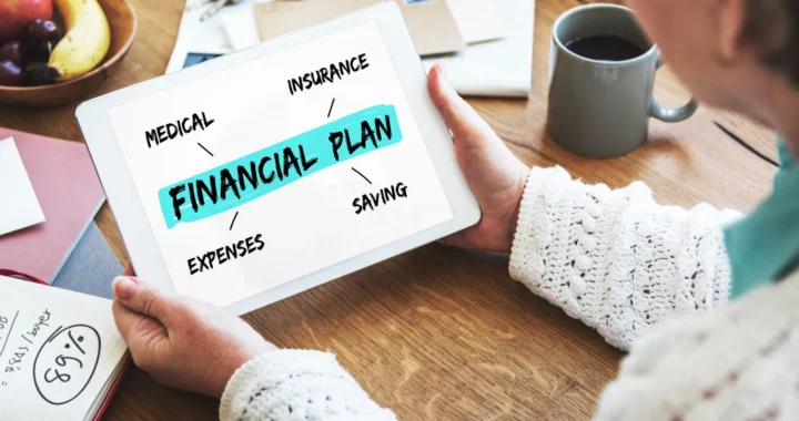Person reviewing a financial planning checklist with a laptop and calculator on a desk